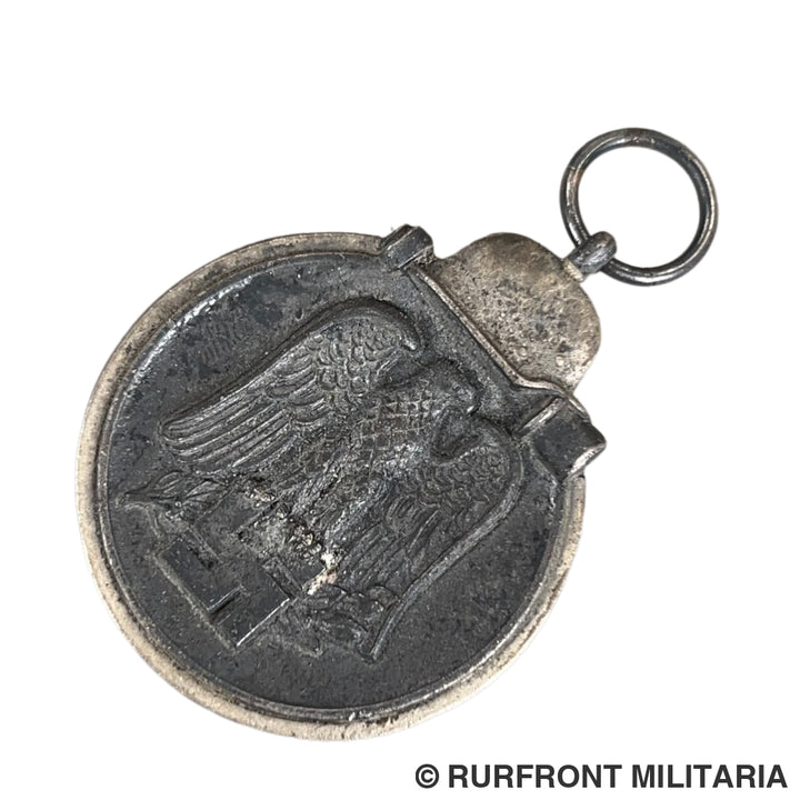 Ostmedaille met zakje Carl Poellath