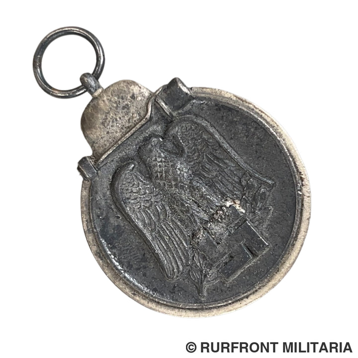 Ostmedaille met zakje Carl Poellath
